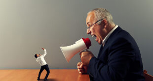 boss screaming at small businessman