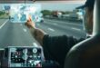 truck driver searching location on digital map.